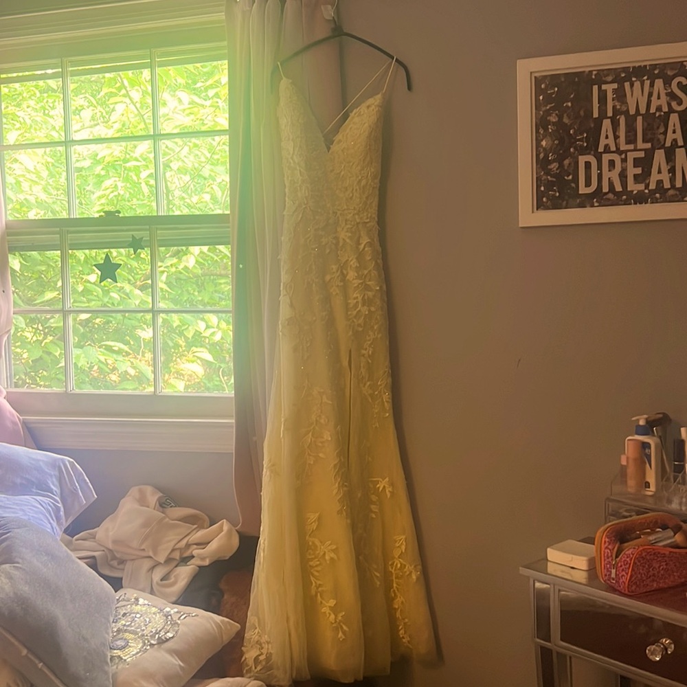 Size 2 yellow dress with an open back from castle couture